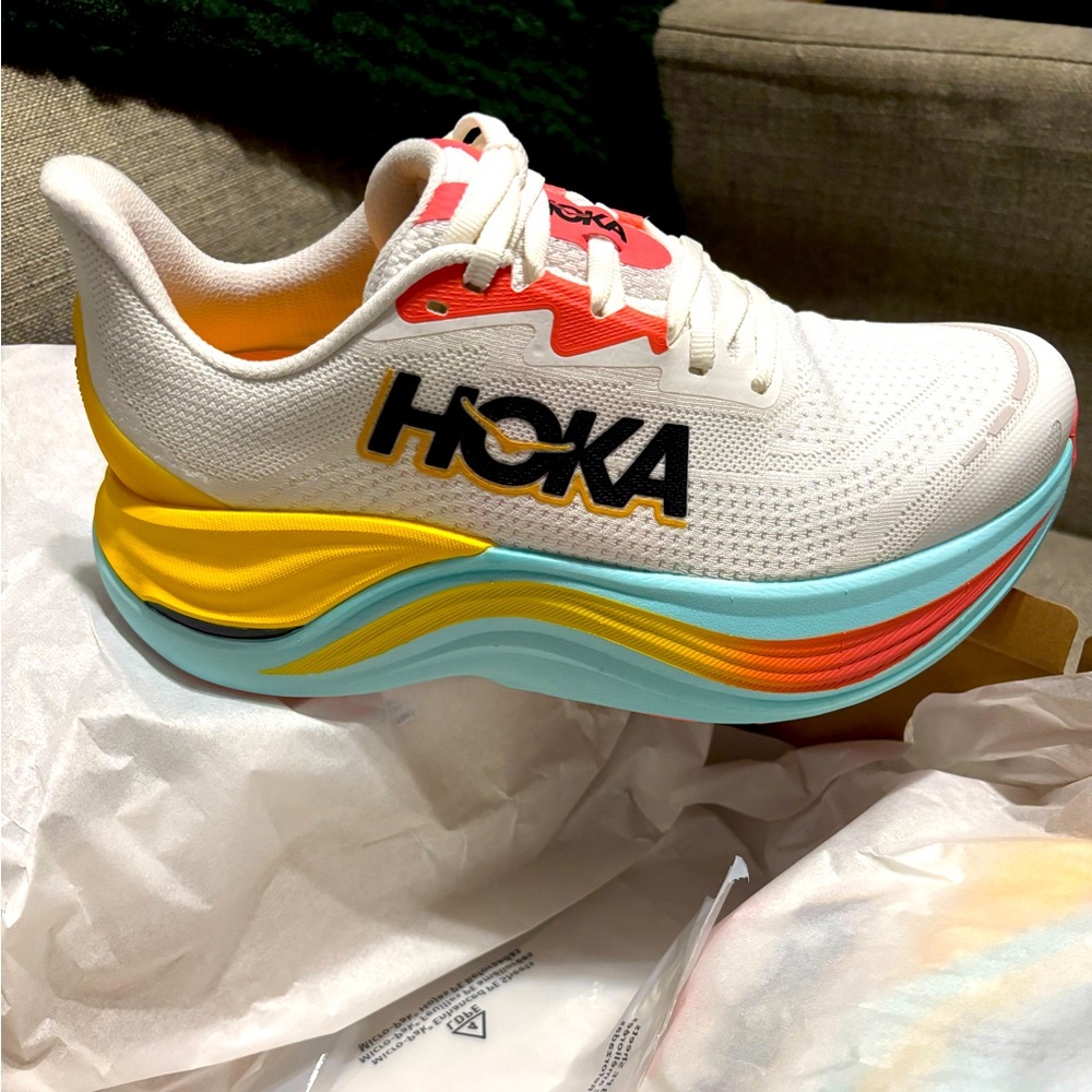 Hoka size 8. White with multi color bottom.